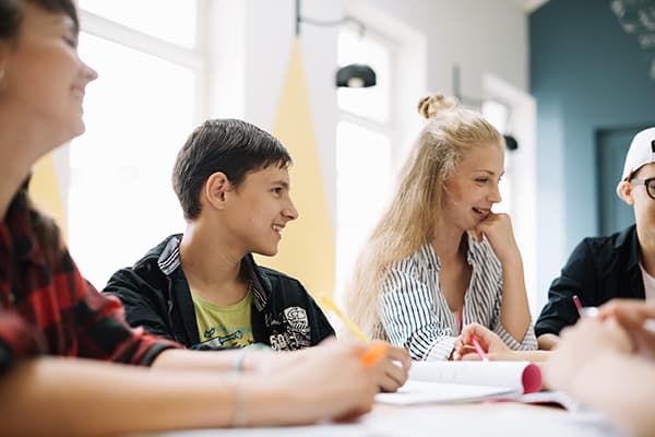 teen class mates in school setting