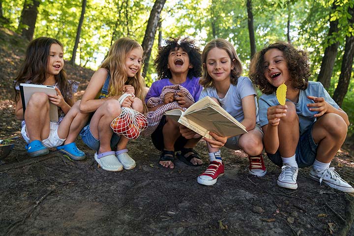 group of middle schoolers learning in nature